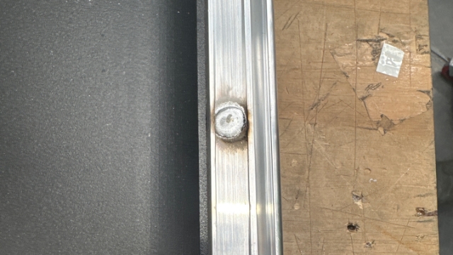 <p>Weld the hinge to the door. Trying not to get the edge of the hinge</p>
