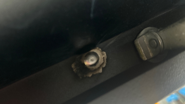 <p>Weld the hinge through the holes. <strong><em>Ensure the weld is covering the holes. If there is a gap around the welds, the hinge will leak.</em></strong></p>