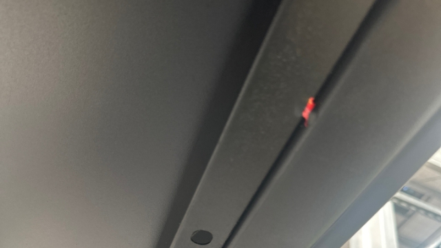 <p>If there is a cable tray on the inside carefully grind off welds marked in red. And set the tray aside. <strong><em>This will make it easier to access for welding, if your welder can reach you won’t have to remove it.</em></strong></p>