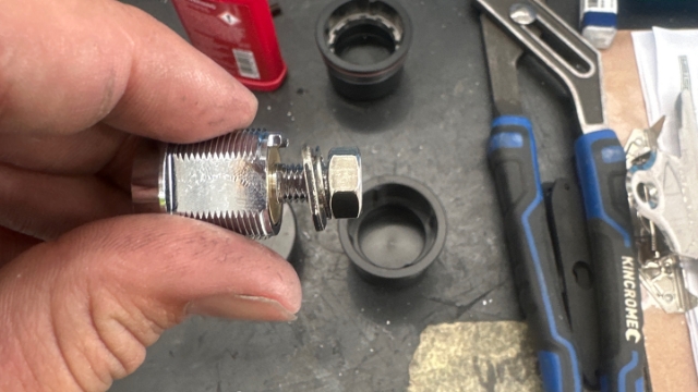 <p>Unscrew bolt from lock barrel</p>