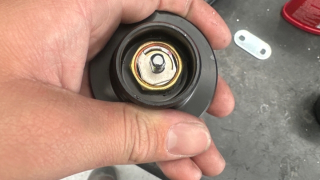 <p>Drop nut over lockbarrel thread and tighten</p>