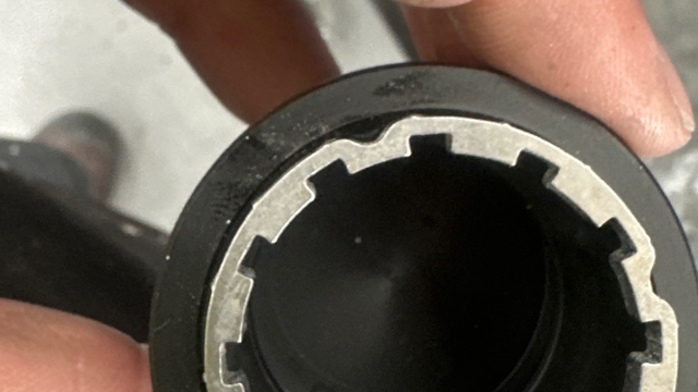 <p>Line up PRT-007473-01 with the grooves along the sides of the bottom half of the fuel cap</p>